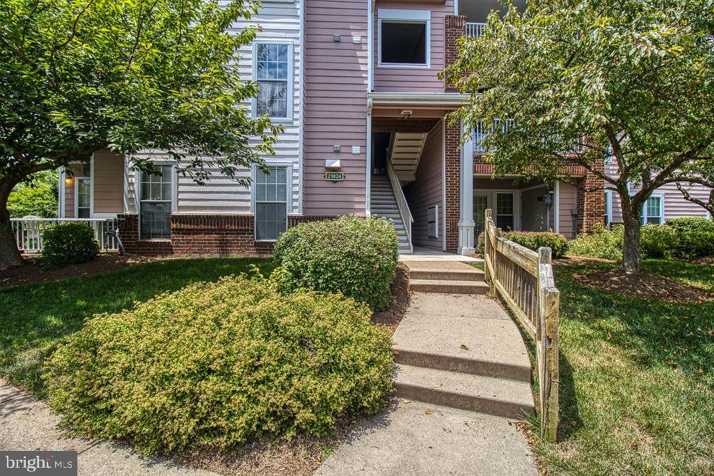 21024 Timber Ridge Terrace, Unit 303 Ashburn, VA 20147 - Photo 3 of 42 Entry To Condo Building