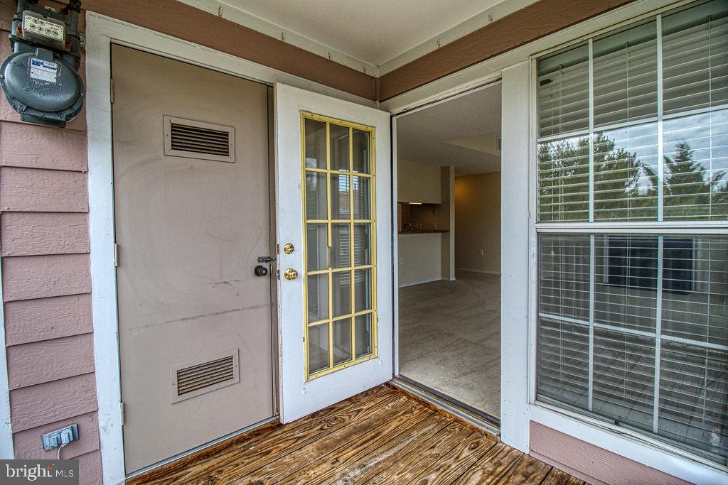 21024 Timber Ridge Terrace, Unit 303 Ashburn, VA 20147 - Photo 22 of 42 Balcony View T\Into Condo Through French Door