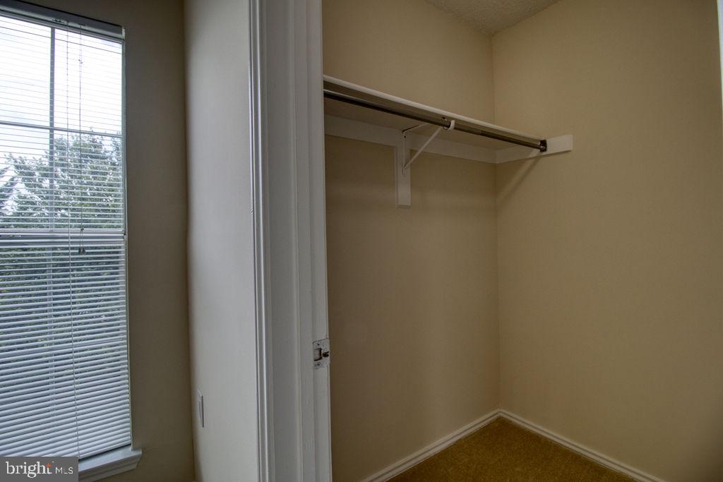 21024 Timber Ridge Terrace, Unit 303 Ashburn, VA 20147 - Photo 30 of 42 Large Walk-In Closet
