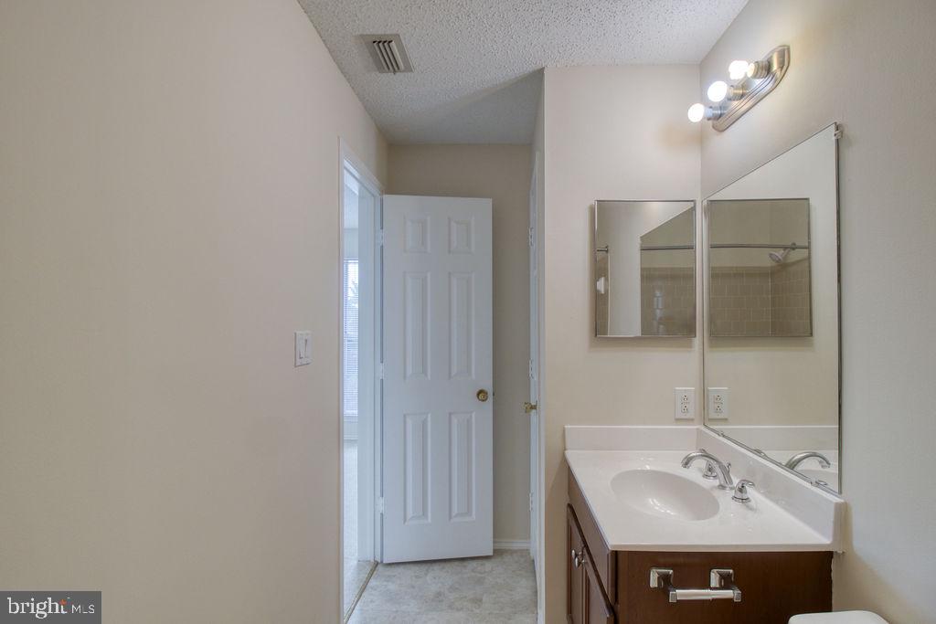 21024 Timber Ridge Terrace, Unit 303 Ashburn, VA 20147 - Photo 33 of 42 Private Master Bathroom