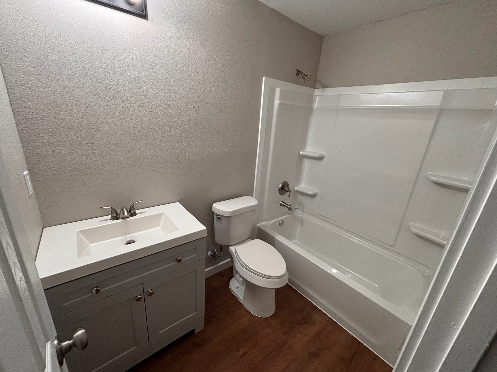 8546 Talton Street Houston, TX 77028 - Photo 6 of 8 a bathroom with a sink a toilet and shower