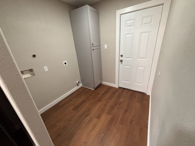 8546 Talton Street Houston, TX 77028 - Photo 7 of 8 an empty room with wooden floor and entrance