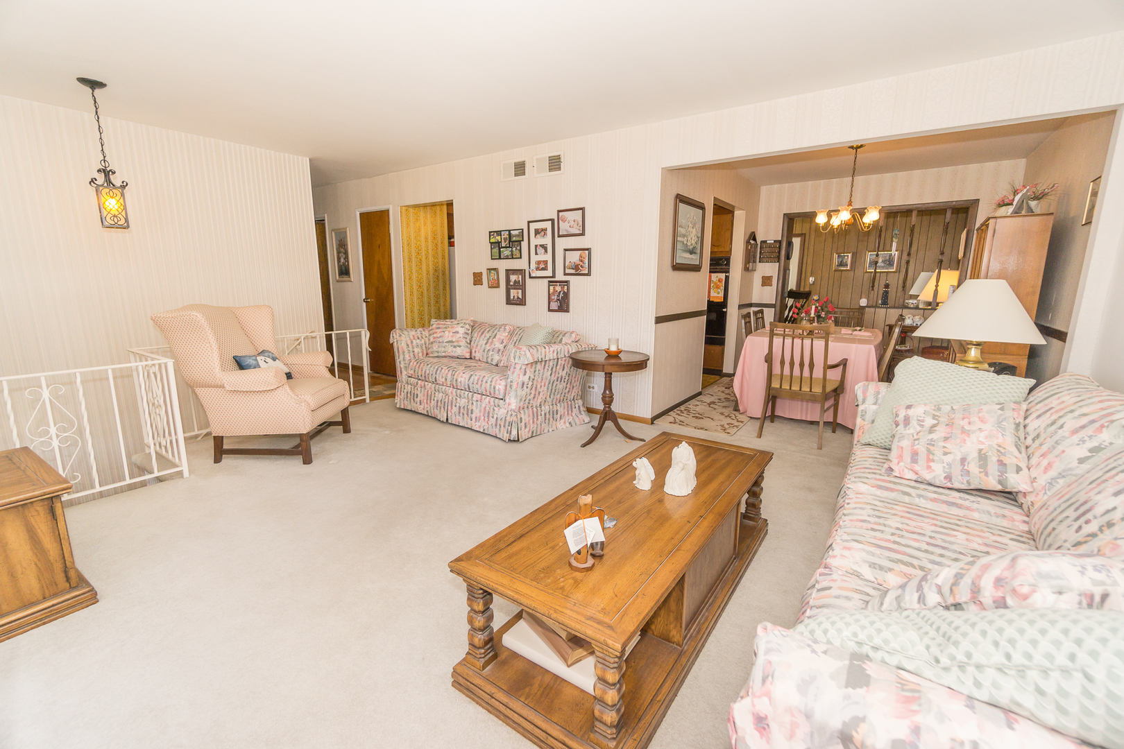78 Evergreen Street Addison, IL 60101 - Photo 2 of 16 a living room with furniture and a large window