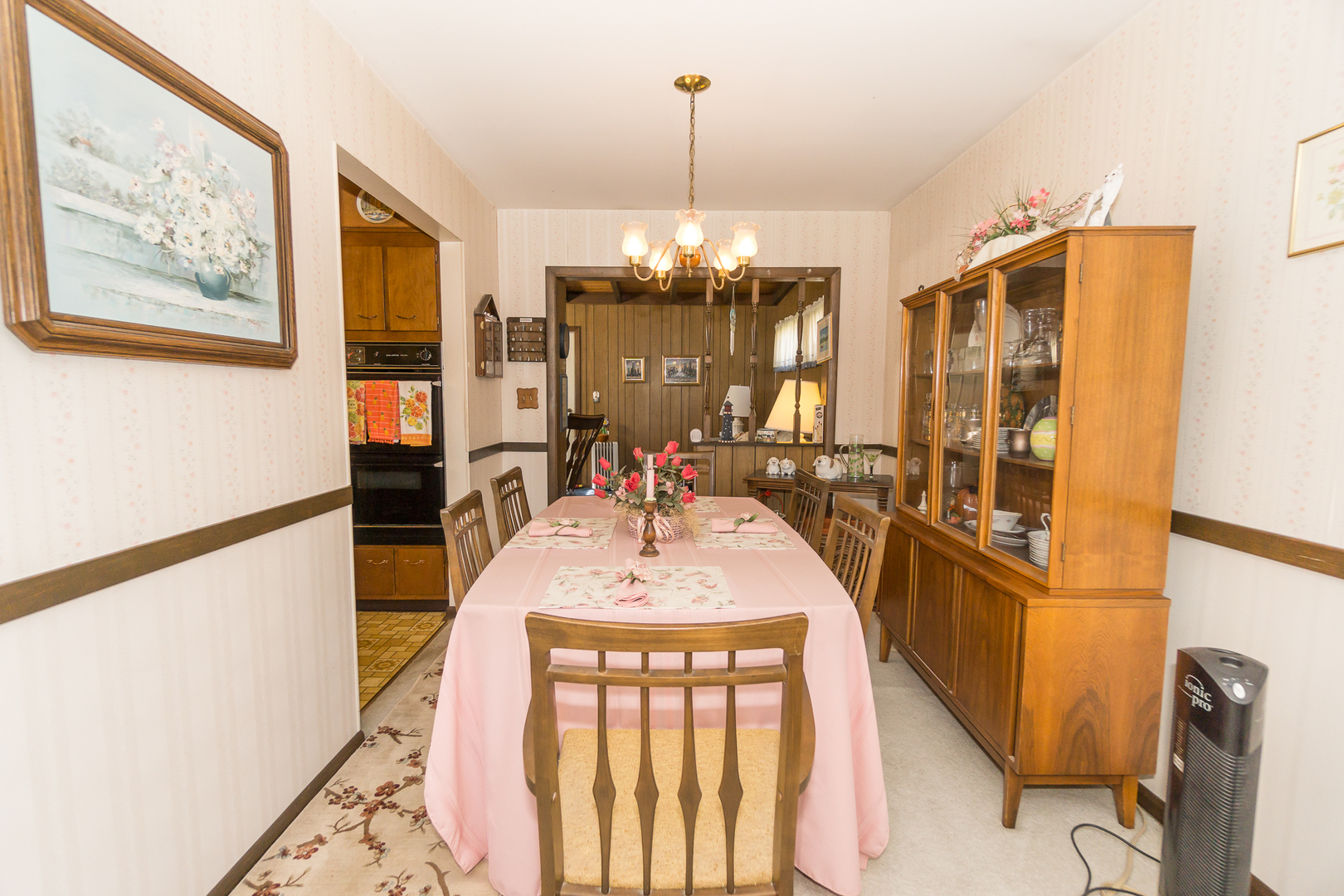 78 Evergreen Street Addison, IL 60101 - Photo 4 of 16 a view of a kitchen with granite countertop a refrigerator and a sink