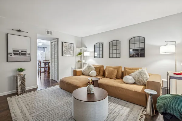 a living room with furniture and a couch