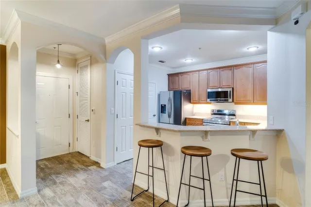 $304,900 | 11565 Mizzon Drive, Unit 101/808, Windermere, FL 34786