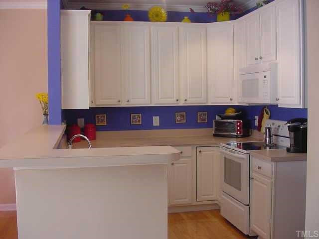 8417 Aztec Dawn Court Raleigh, NC 27613 - Photo 6 of 10 This spacious kitchen offers lots of counter space, cabinets, and a pantry! Other