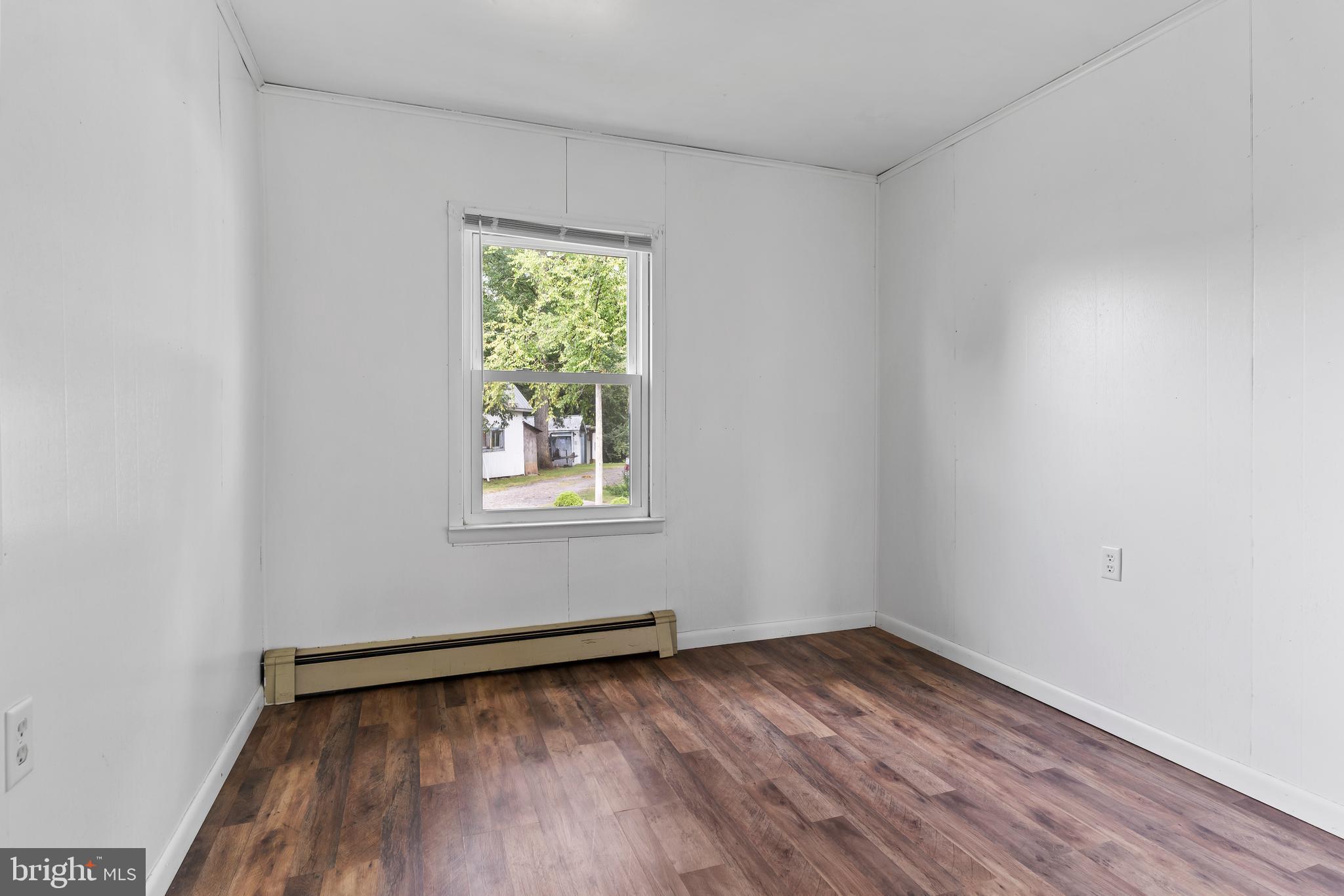 2103 Smoketown Road Fayetteville, PA 17222 - Photo 17 of 28 a view of a room with wooden floor and window