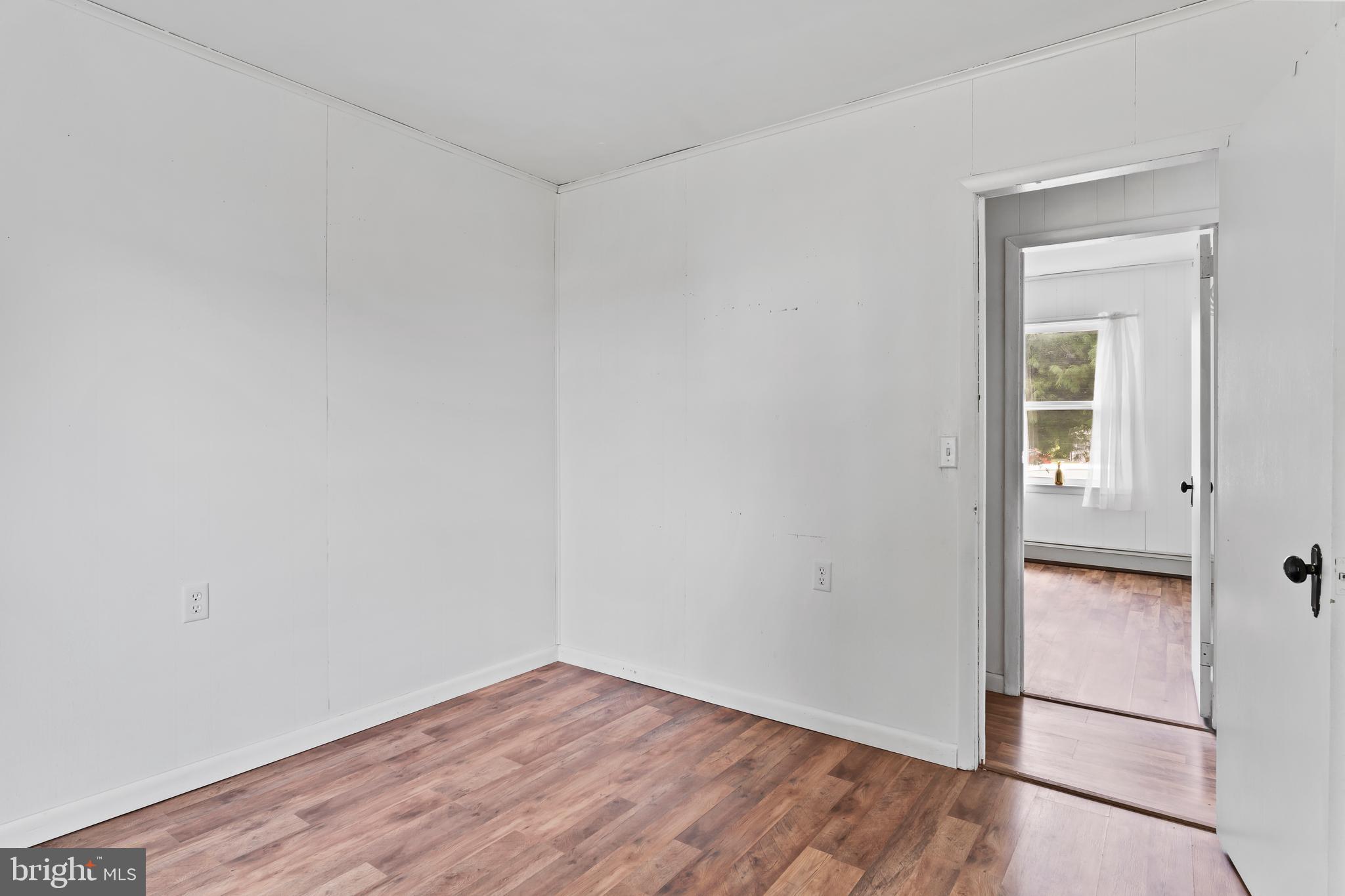 2103 Smoketown Road Fayetteville, PA 17222 - Photo 18 of 28 wooden floor in an empty room