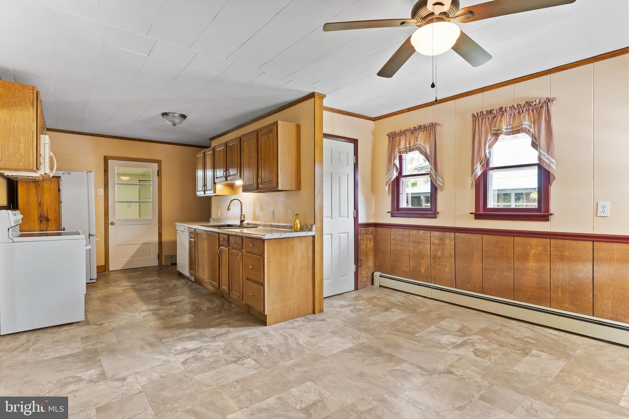 2103 Smoketown Road Fayetteville, PA 17222 - Photo 22 of 28 a view of kitchen with windows and refrigerator