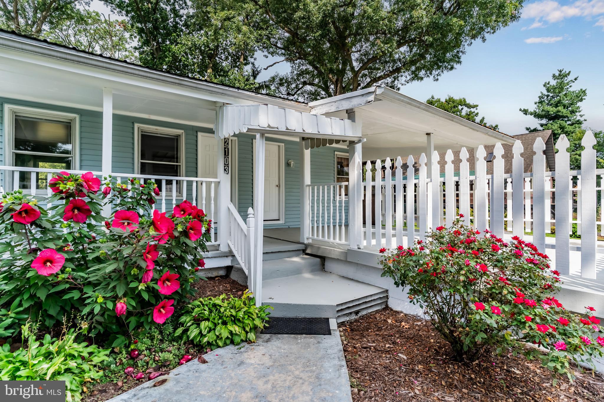 2103 Smoketown Road Fayetteville, PA 17222 - Photo 3 of 28 a view of a house with flower garden