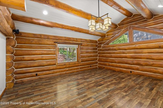 a view of room with stairs and a closet
