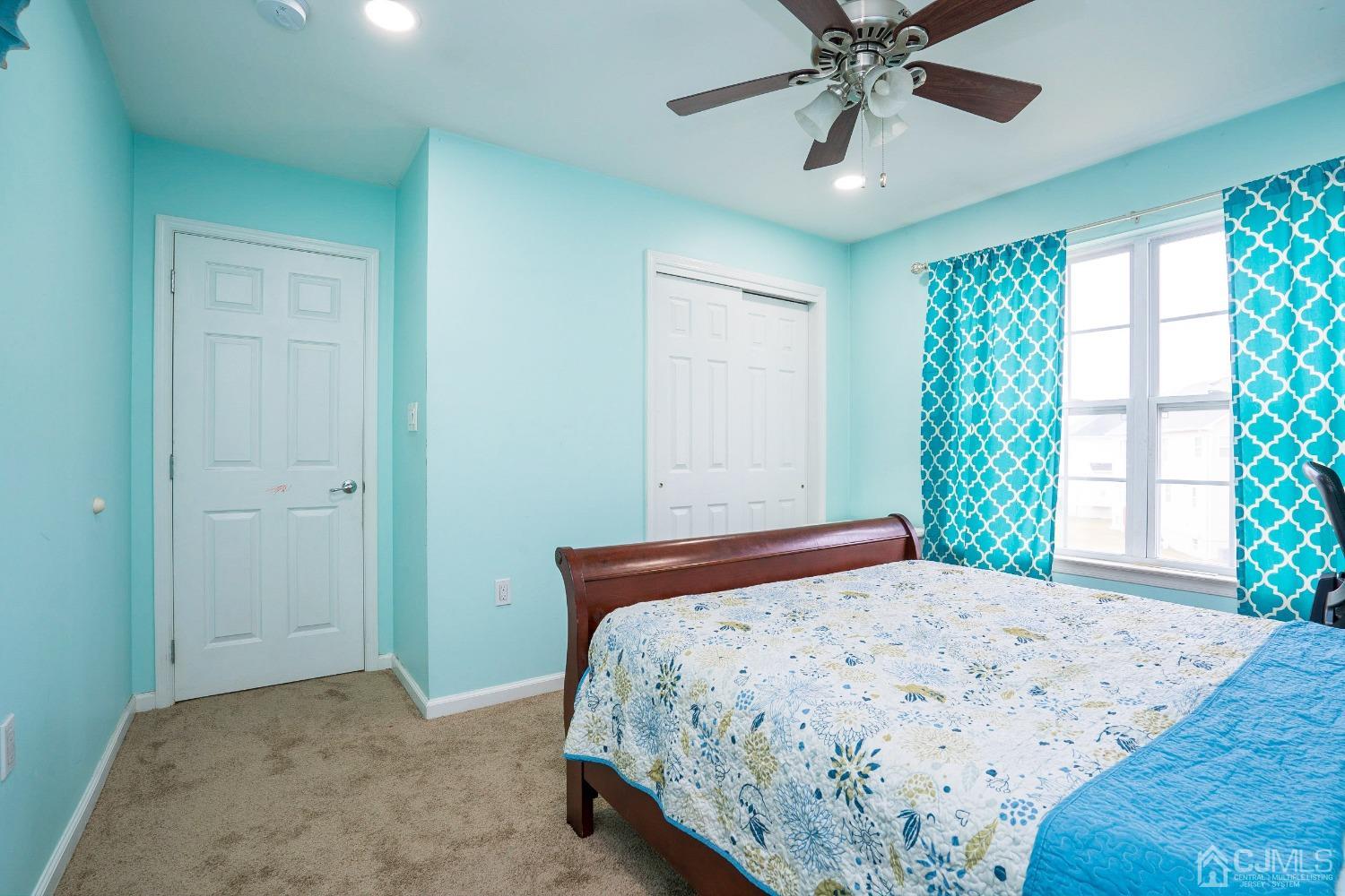 8 Maxwell Road Monroe Township, NJ 08831 - Photo 20 of 40 a bedroom with a bed and window