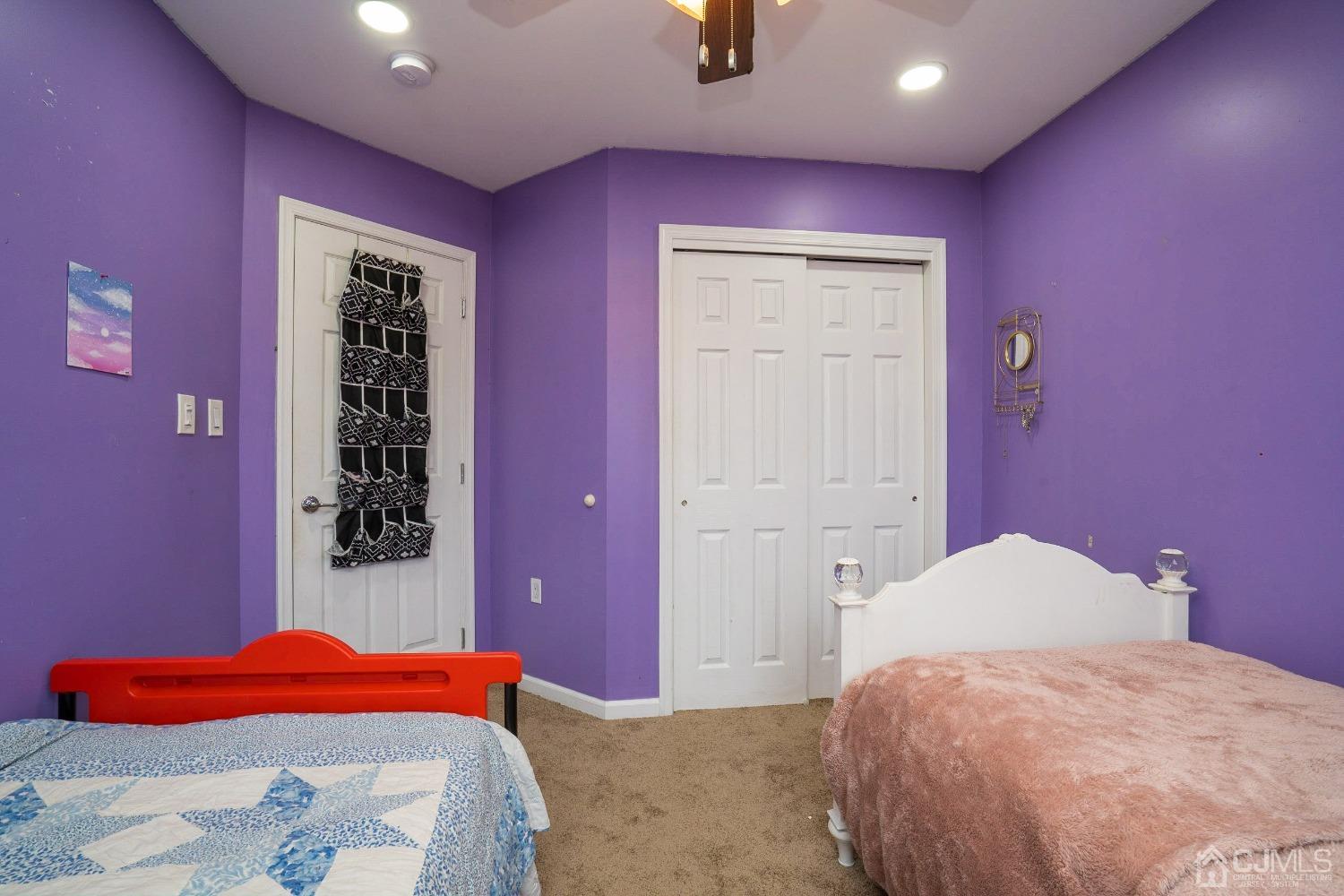 8 Maxwell Road Monroe Township, NJ 08831 - Photo 24 of 40 a bedroom with a bed and a dresser