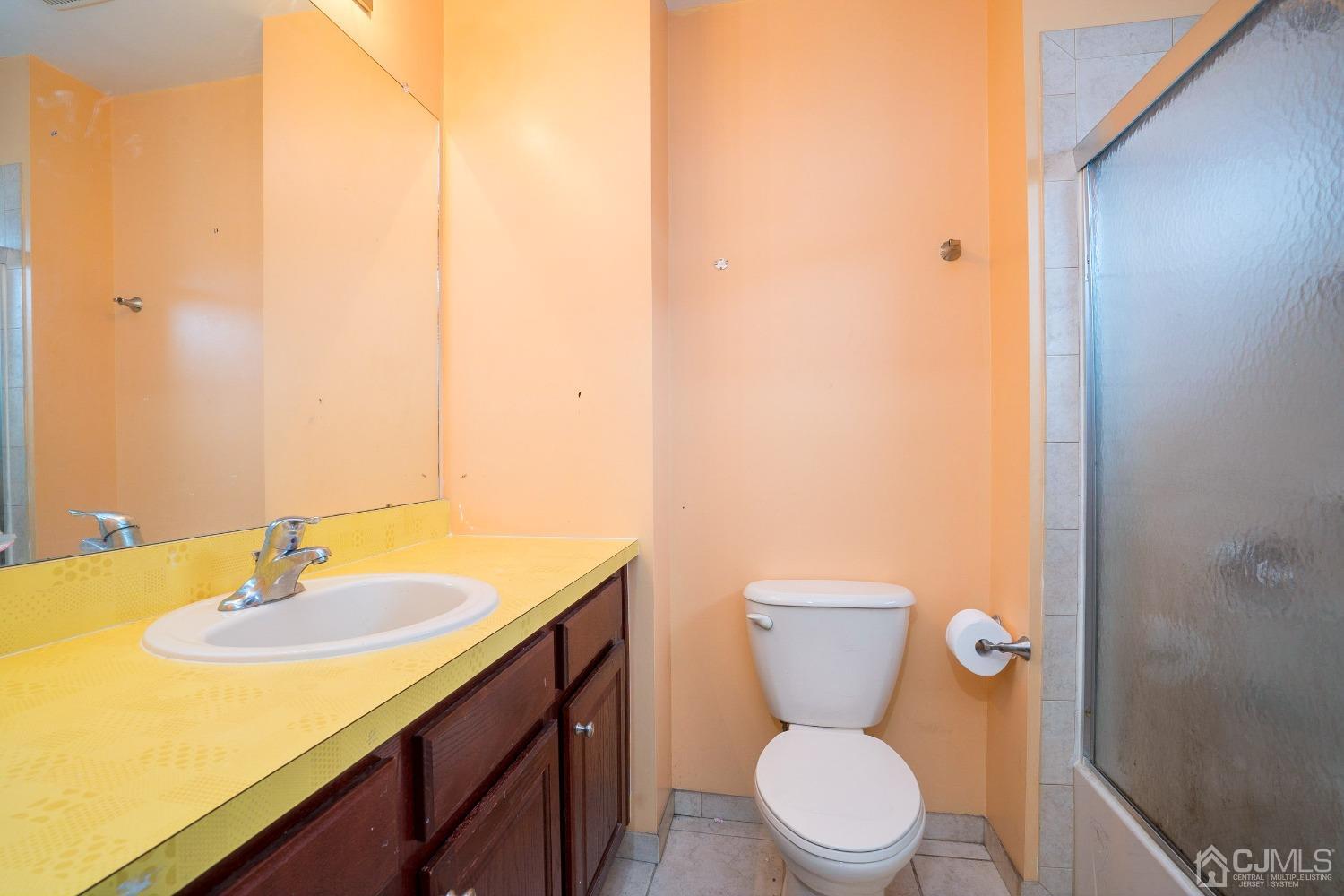 8 Maxwell Road Monroe Township, NJ 08831 - Photo 25 of 40 a bathroom with a sink and a toilet