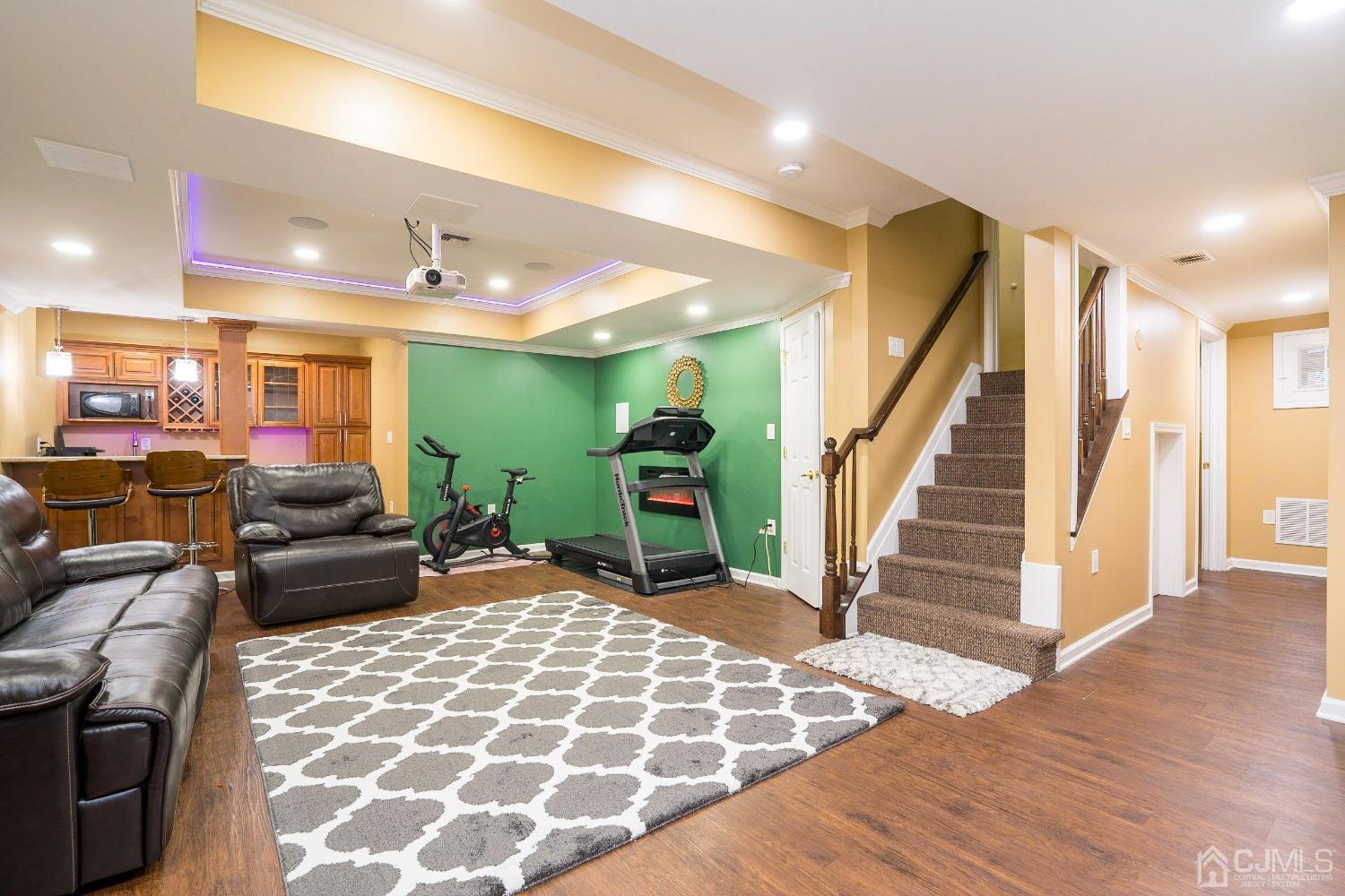 8 Maxwell Road Monroe Township, NJ 08831 - Photo 30 of 40 a living room with furniture and a fireplace