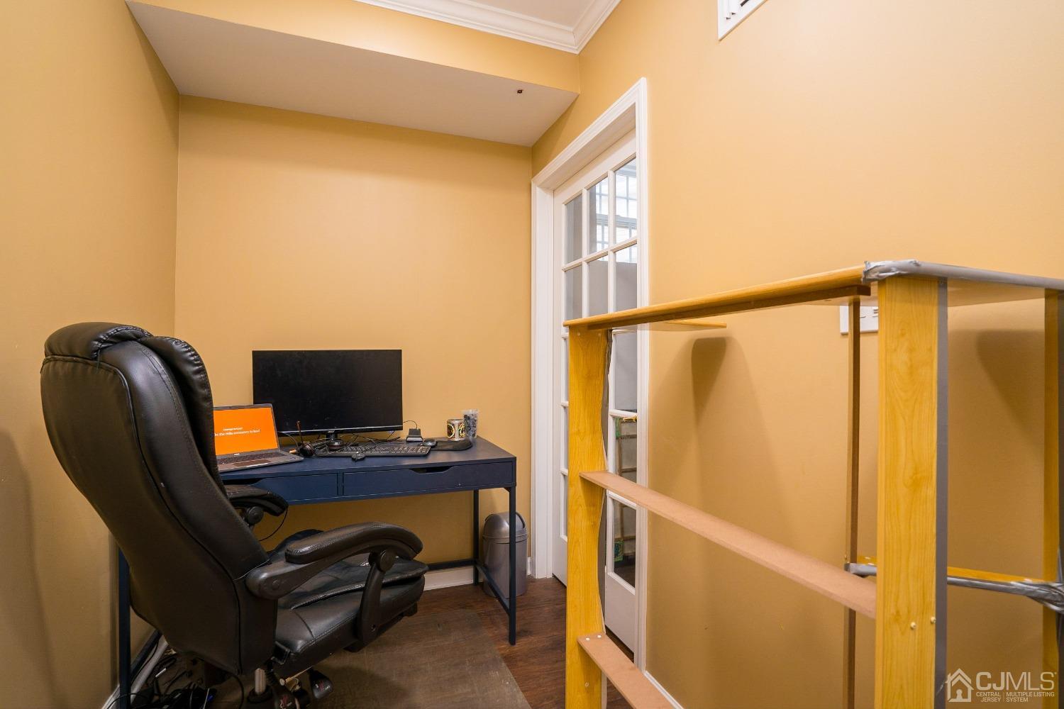 8 Maxwell Road Monroe Township, NJ 08831 - Photo 35 of 40 a view of a workspace with furniture and a window
