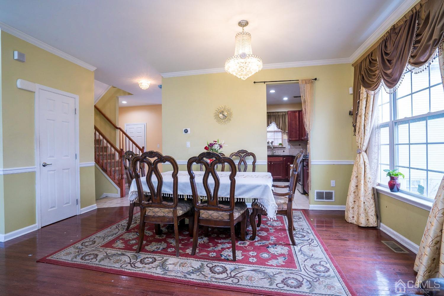 8 Maxwell Road Monroe Township, NJ 08831 - Photo 5 of 40 a view of a dining room with furniture
