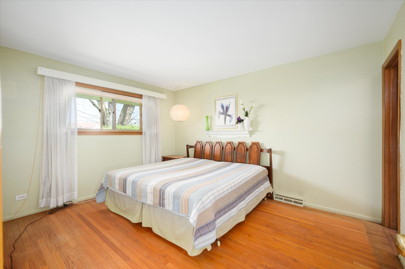 366 Lance Drive Des Plaines, IL 60016 - Photo 14 of 33 a bedroom with a bed and wooden floor