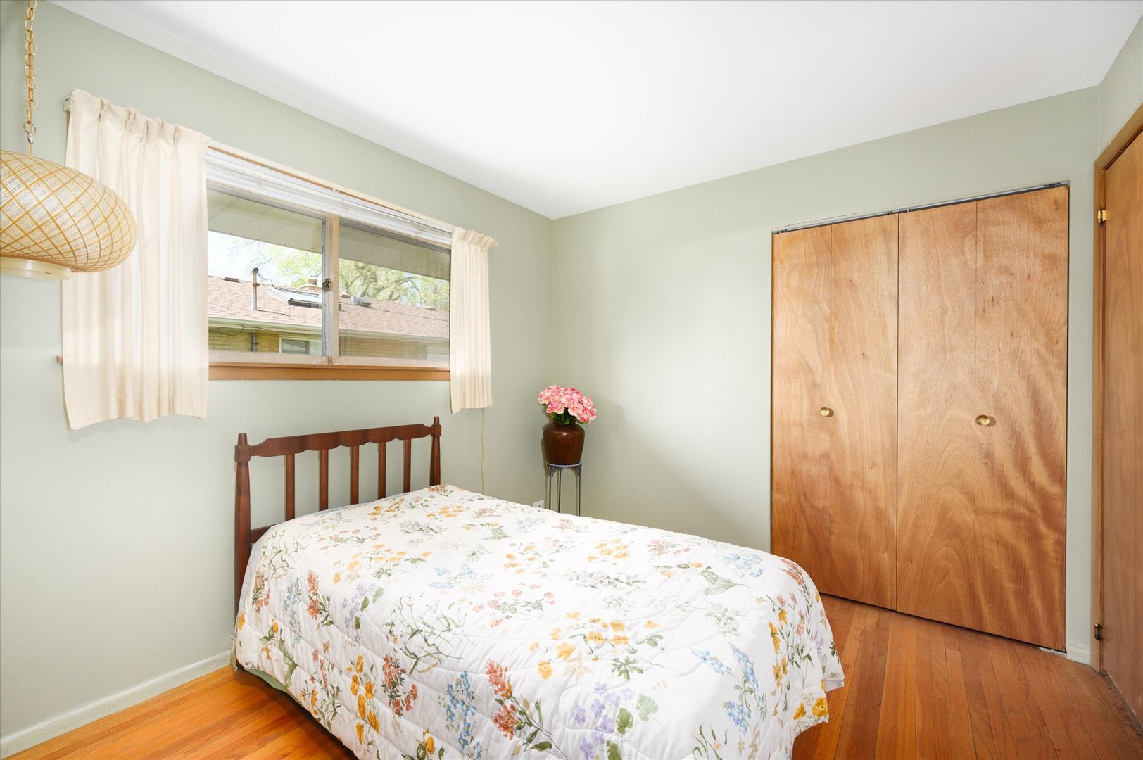 366 Lance Drive Des Plaines, IL 60016 - Photo 16 of 33 a bedroom with a bed and a window