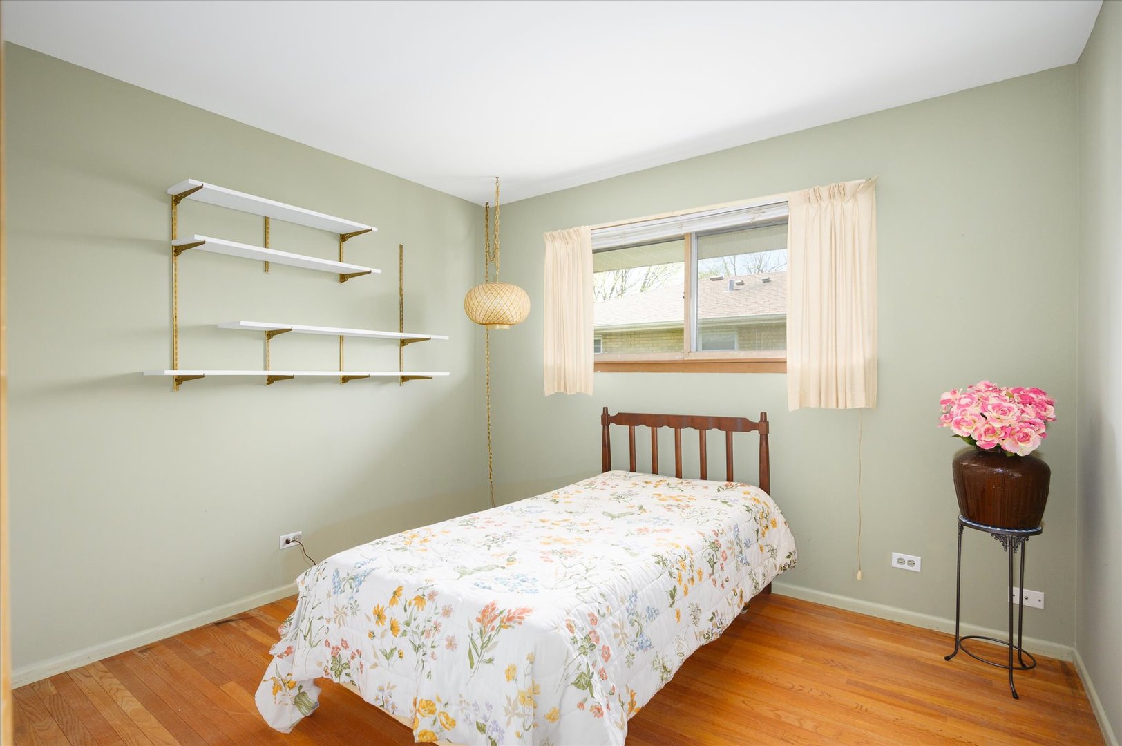 366 Lance Drive Des Plaines, IL 60016 - Photo 17 of 33 a bedroom with a bed and a chandelier