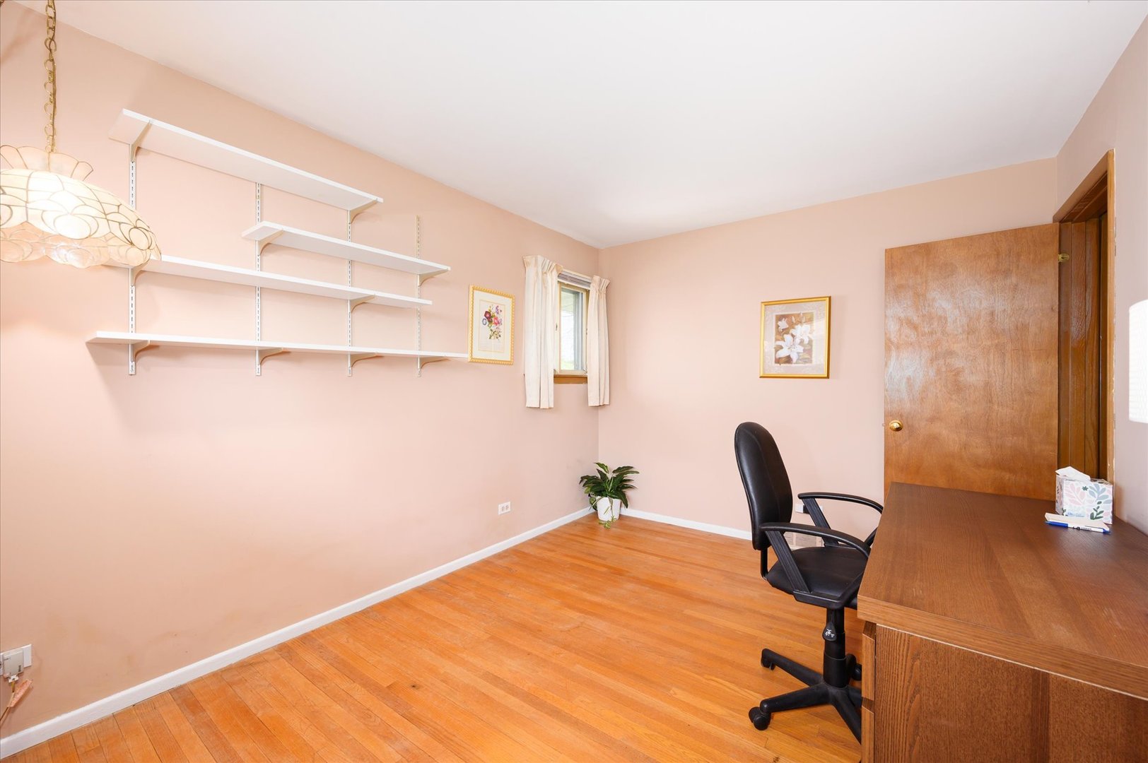 366 Lance Drive Des Plaines, IL 60016 - Photo 19 of 33 a view of a workspace with furniture and wooden floor