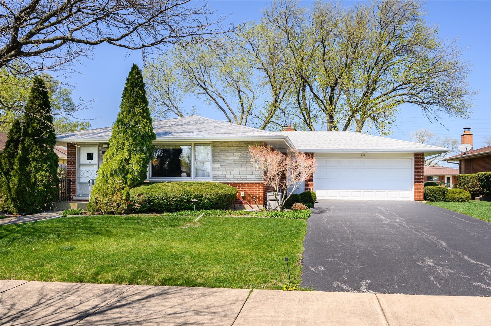 366 Lance Drive Des Plaines, IL 60016 - Photo 2 of 33 front view of a house with a yard