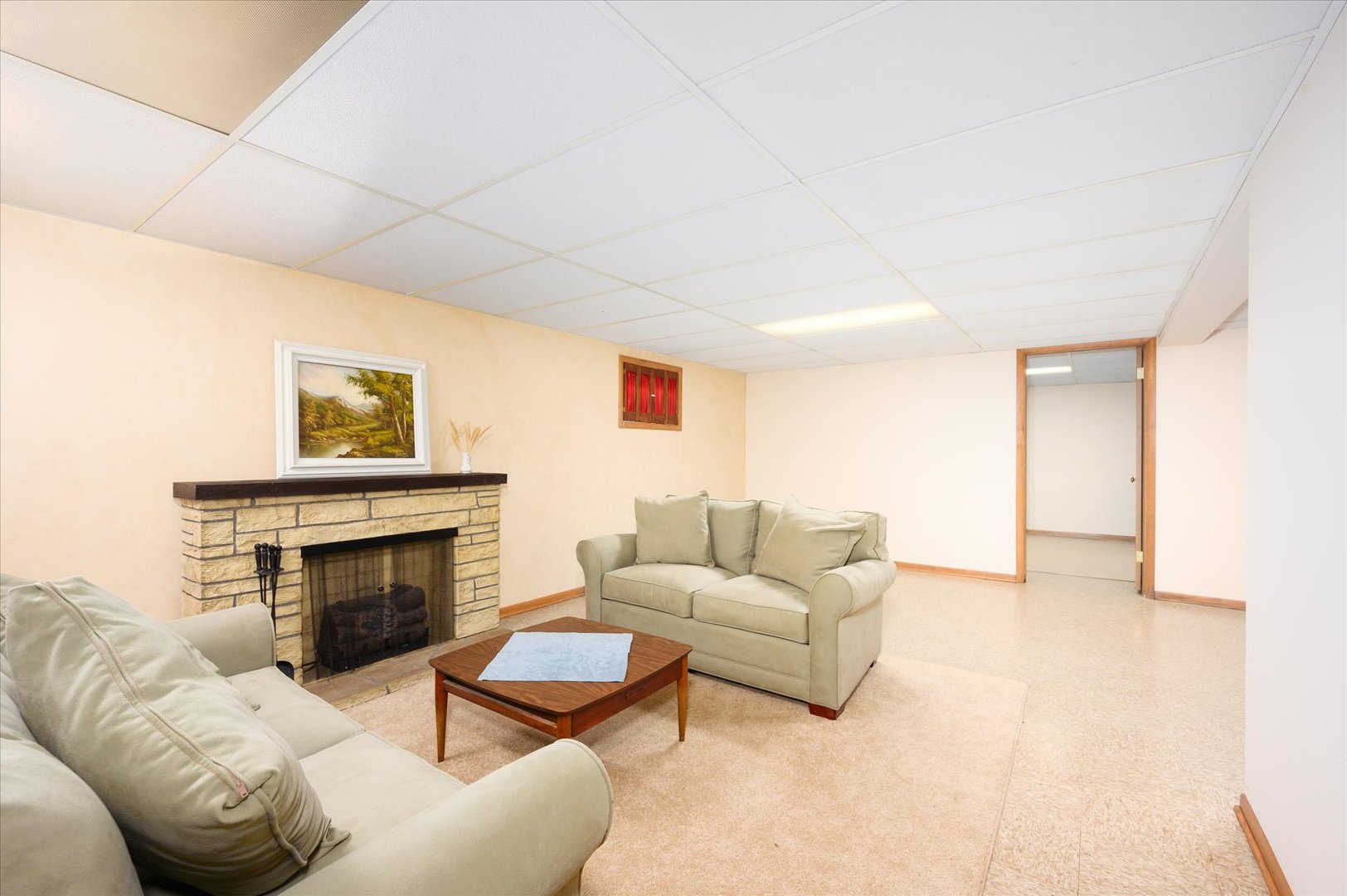 366 Lance Drive Des Plaines, IL 60016 - Photo 21 of 33 a living room with furniture and a fireplace