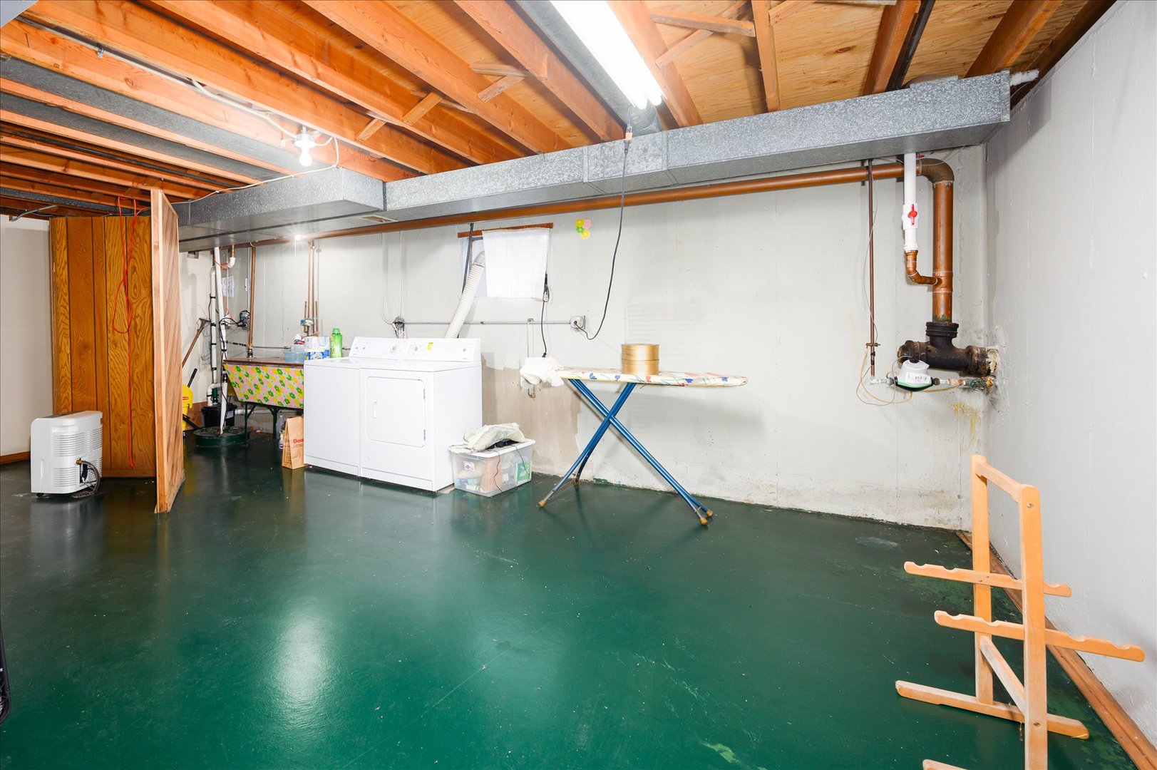366 Lance Drive Des Plaines, IL 60016 - Photo 26 of 33 a view of a room with gym equipment and a large window