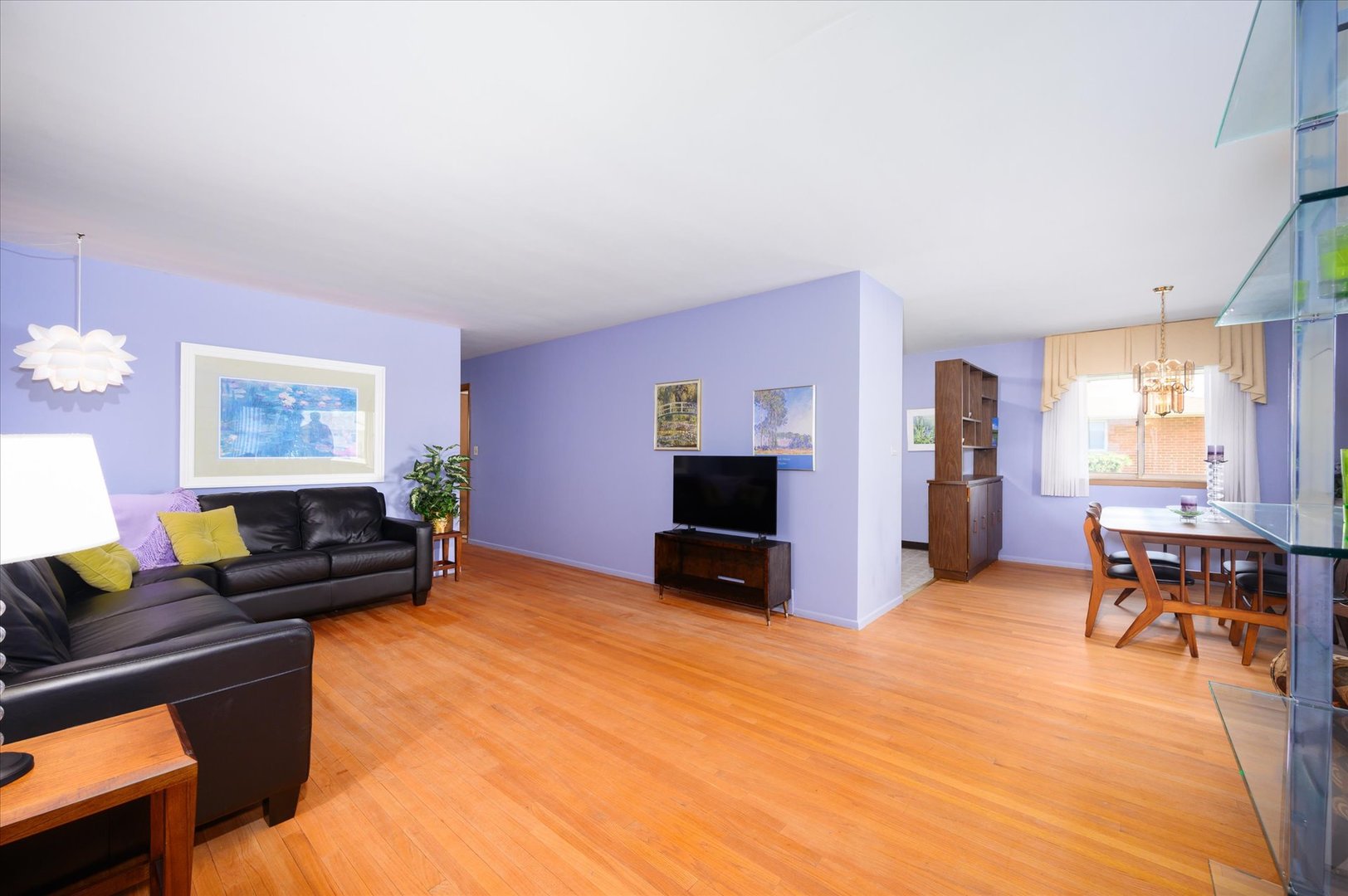 366 Lance Drive Des Plaines, IL 60016 - Photo 3 of 33 a living room with furniture and a flat screen tv