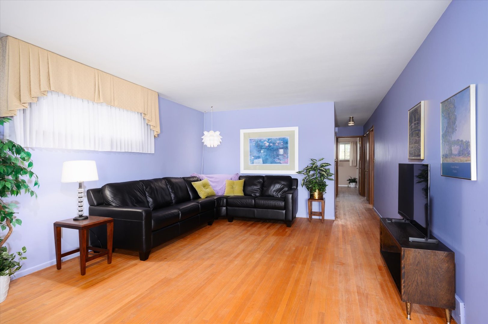 366 Lance Drive Des Plaines, IL 60016 - Photo 4 of 33 a living room with furniture and a flat screen tv