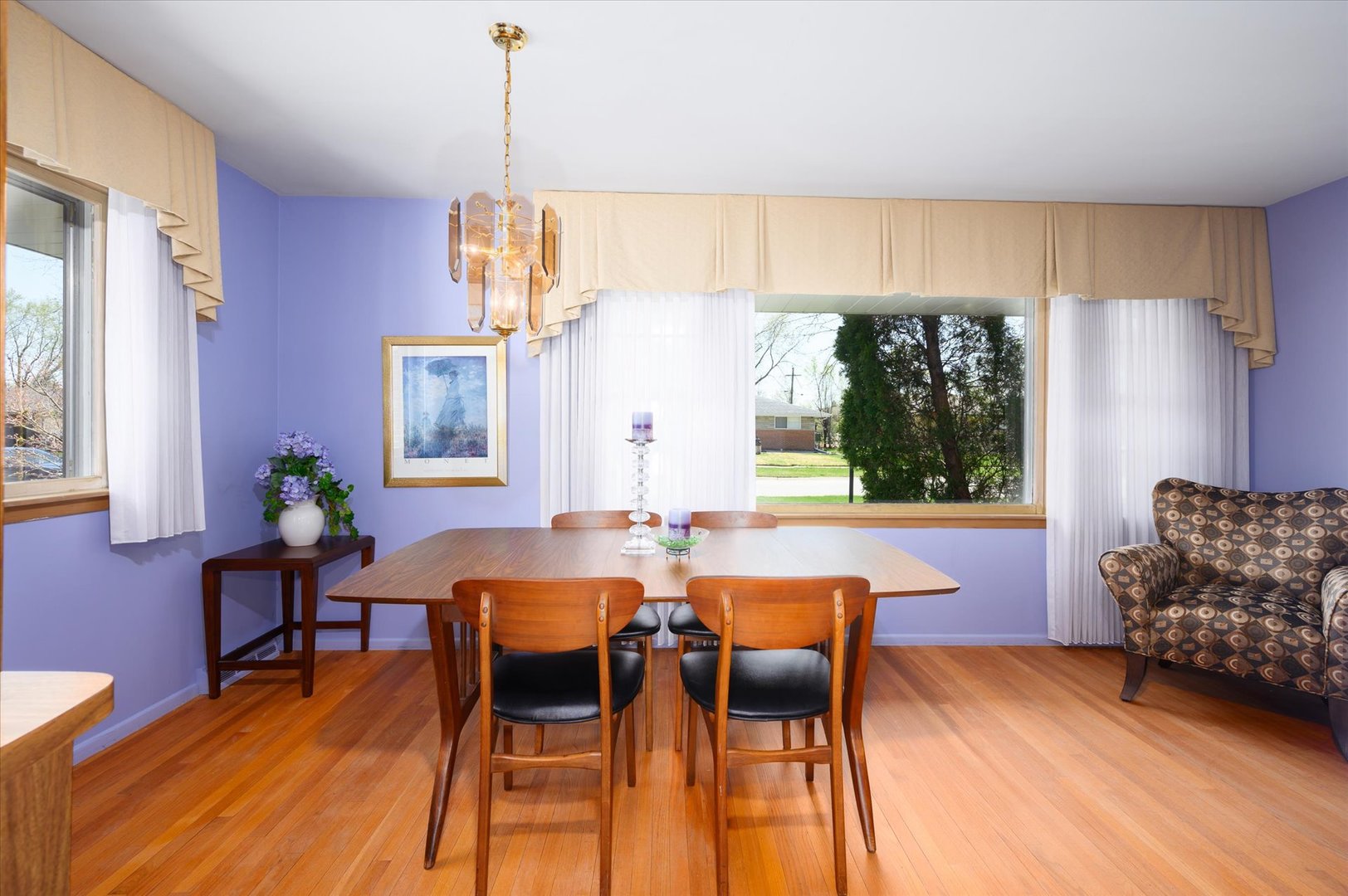 366 Lance Drive Des Plaines, IL 60016 - Photo 6 of 33 a dining room with furniture a chandelier and wooden floor