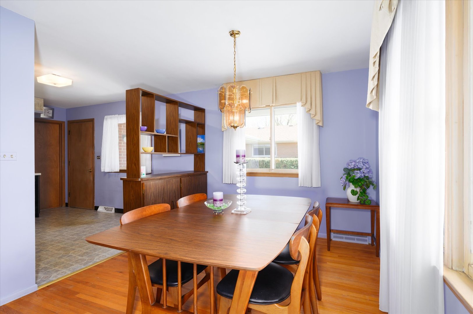 366 Lance Drive Des Plaines, IL 60016 - Photo 7 of 33 a view of a dining room with furniture window and wooden floor