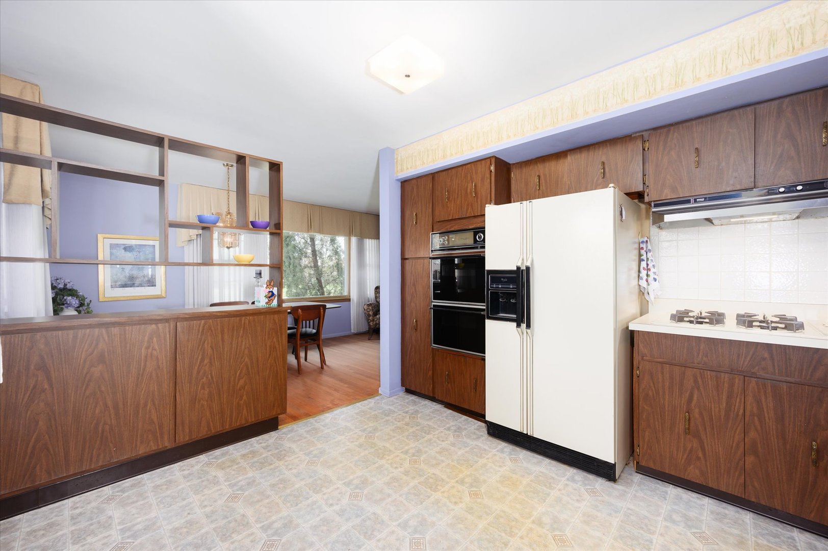 366 Lance Drive Des Plaines, IL 60016 - Photo 9 of 33 a kitchen with refrigerator and cabinets