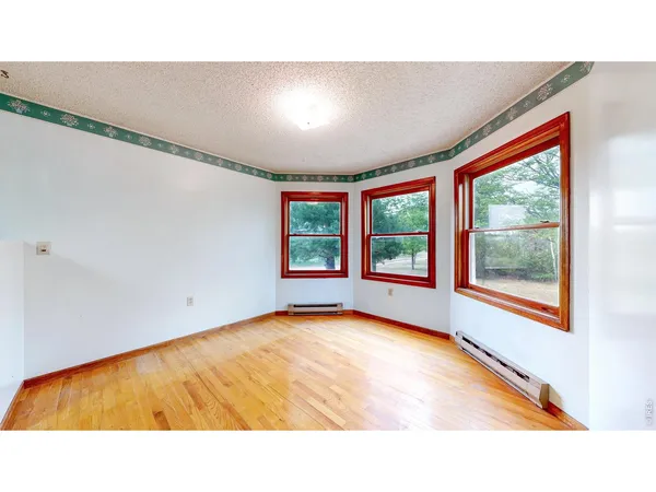 a open hall with an empty room