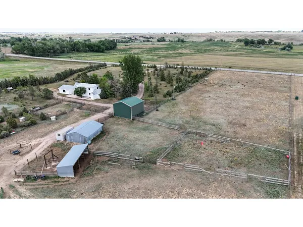 a view of a lake with a yard