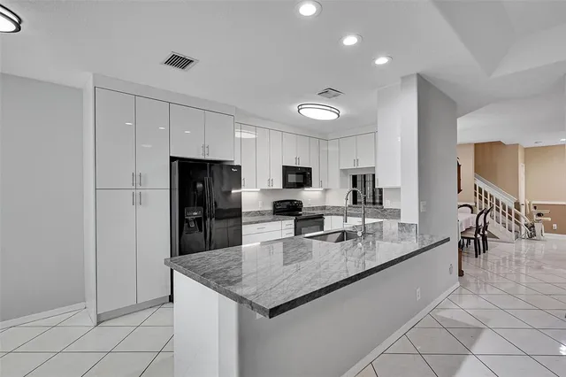 $475,000 | 9640 Royal Palm Boulevard, Coral Springs, FL 33065