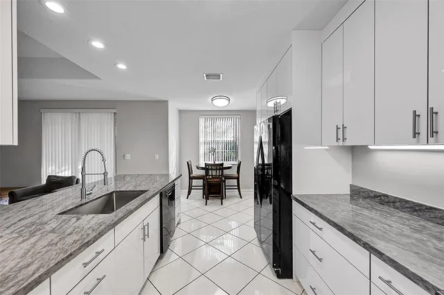 $475,000 | 9640 Royal Palm Boulevard, Coral Springs, FL 33065