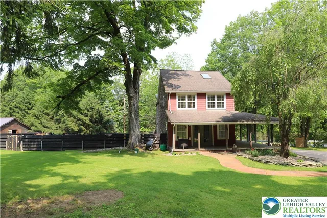 a view of backyard with green space
