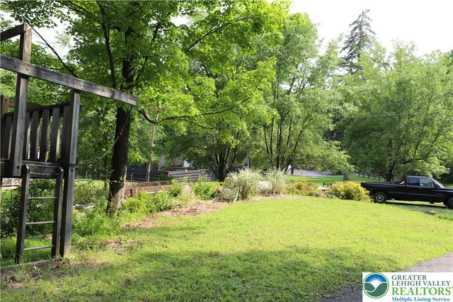 a view of a bench in a garden