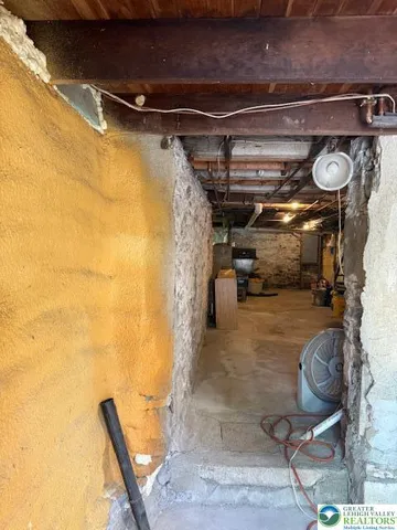 a view of a room with a large window