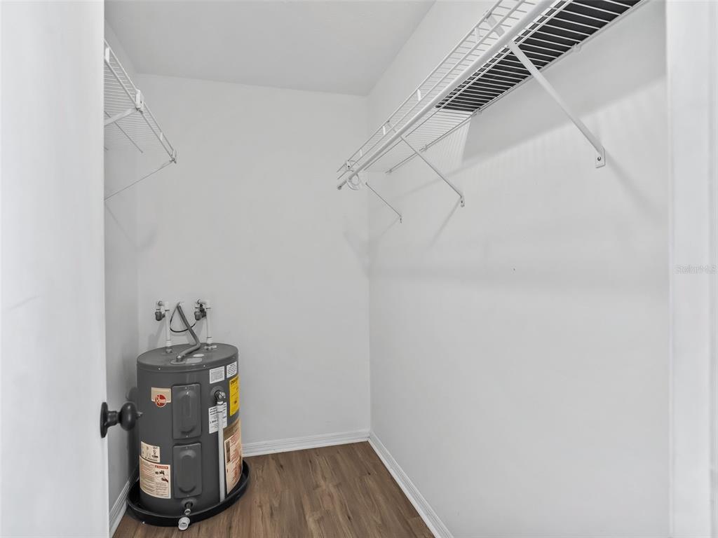 5911 Northwest 9th Street Ocala, FL 34482 - Photo 19 of 37 a view of a room with wooden floor