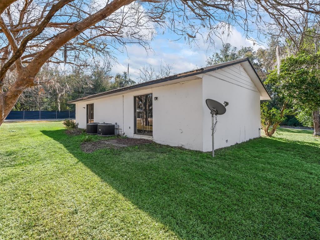 5911 Northwest 9th Street Ocala, FL 34482 - Photo 37 of 37 a view of a house with backyard