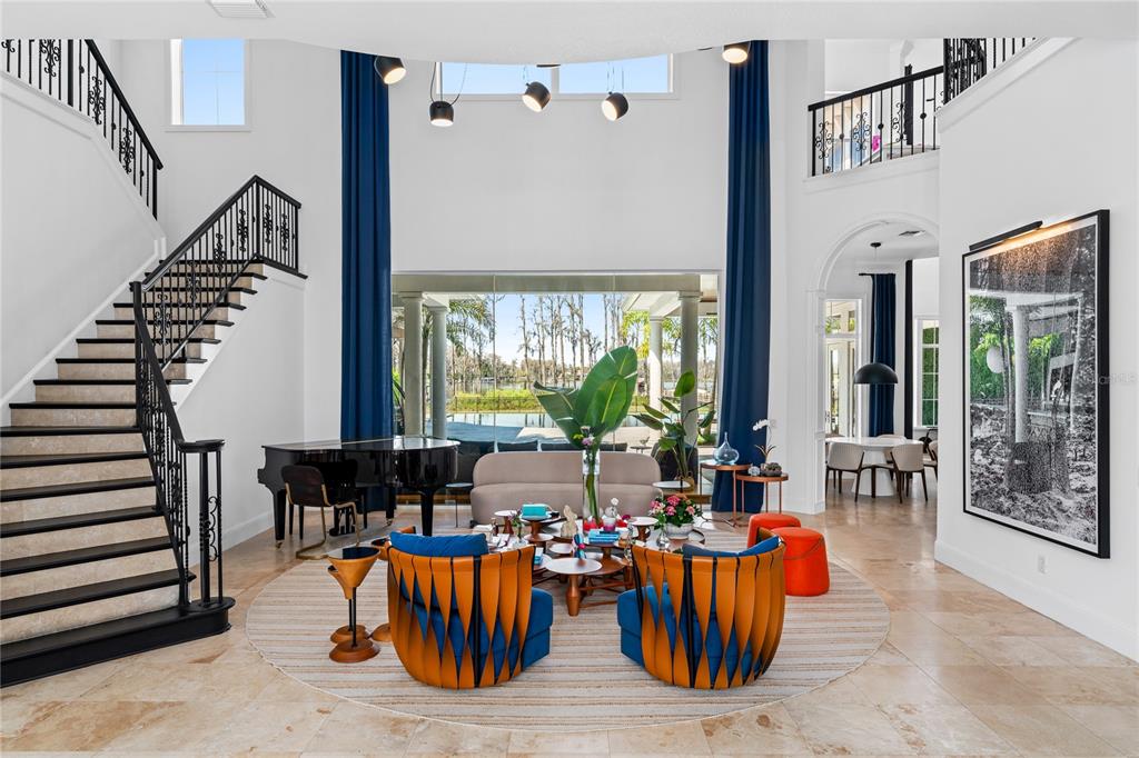 9343 Tibet Pointe Circle Windermere, FL 34786 - Photo 17 of 98 a view of a dining room with furniture window and wooden floor
