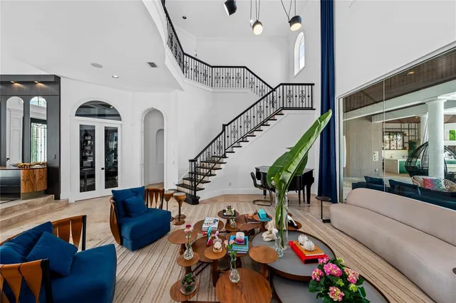 a kitchen with stainless steel appliances granite countertop a refrigerator and microwave