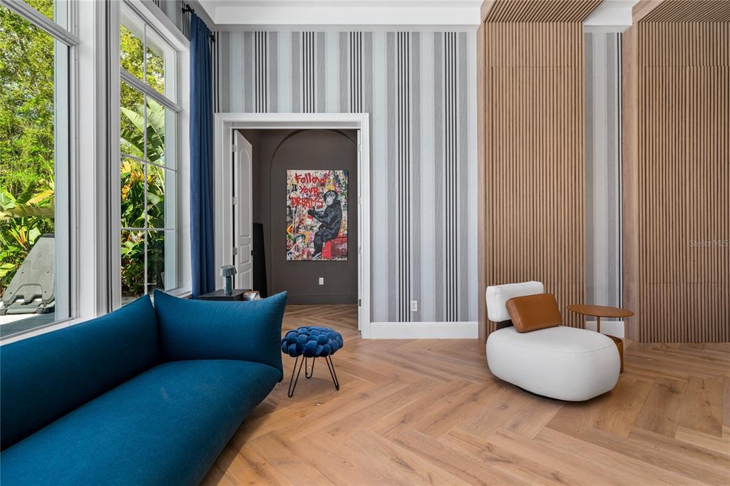 9343 Tibet Pointe Circle Windermere, FL 34786 - Photo 46 of 98 a living room with furniture and a window