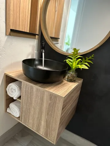 a view of a ocean with a building in the background