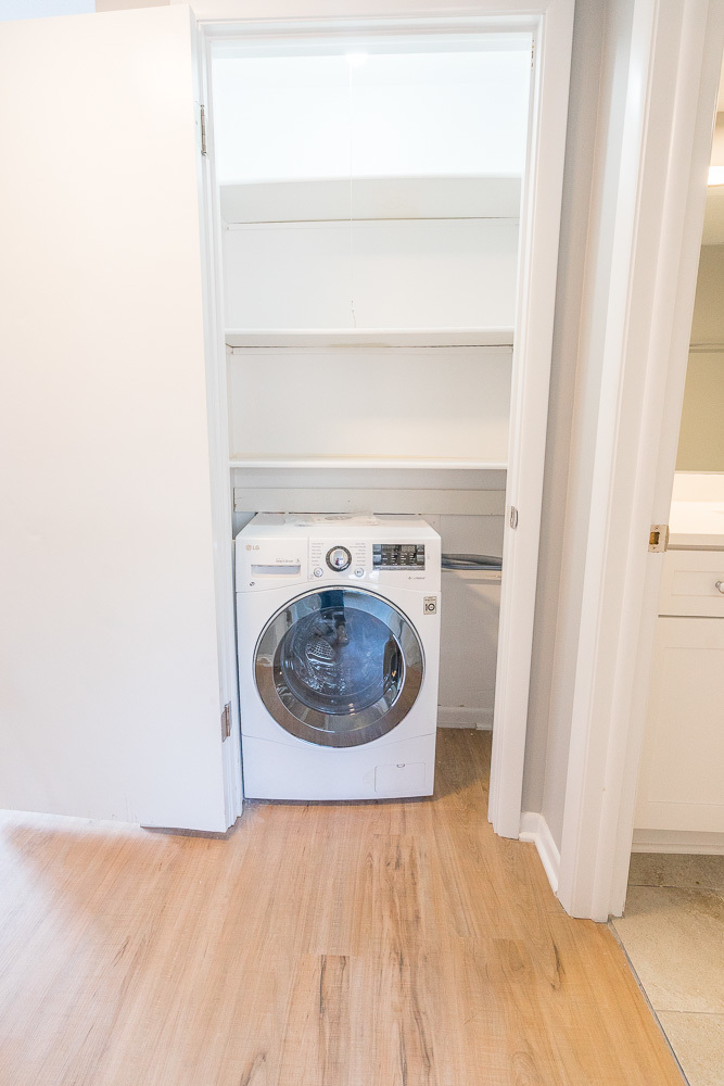 21 South Waiola Avenue, Unit 7 La Grange, IL 60525 - Photo 18 of 18 a utility room with washing machine