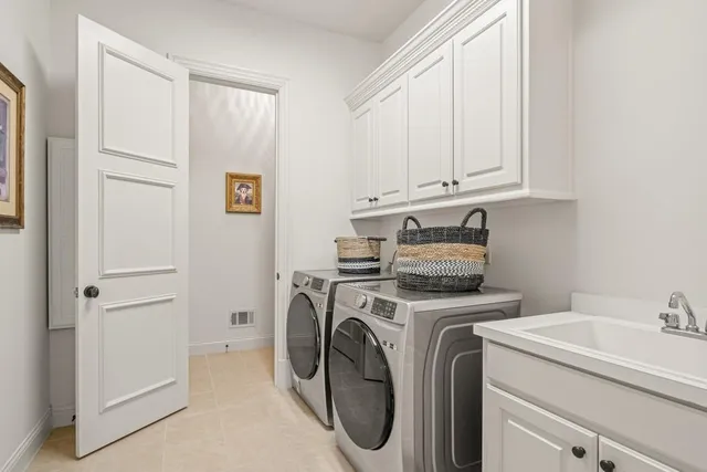 a bathroom with a sink a mirror and a toilet
