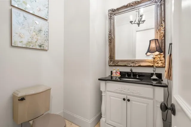 a workspace with furniture and a potted plant